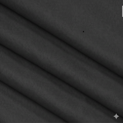 Close-up of Black semi-blackout curtain fabric showing soft texture