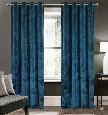 Navy blackout curtains set of 2 hanging on window in modern room