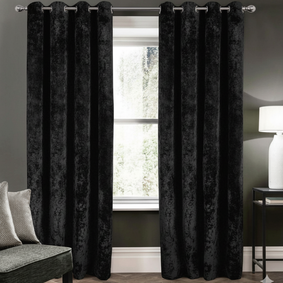 black blackout curtains set of 2 hanging on window in modern room