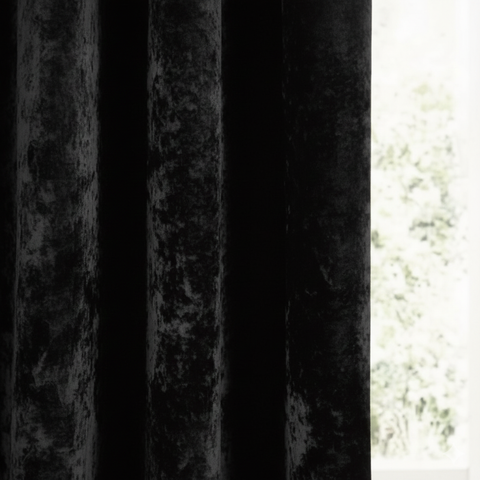 Close-up of black blackout curtain fabric showing thick texture